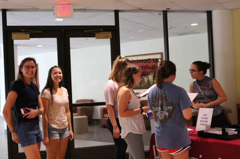 Students checking in at the Student welcome event